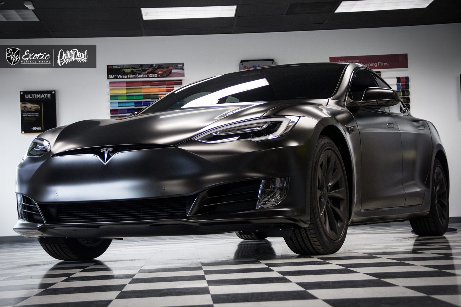 Matte Black Car Wrap Transforms Tesla - HS Sign Shop